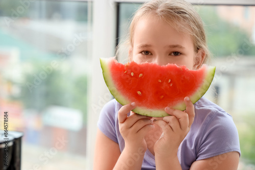 Little girl with fresh wate...