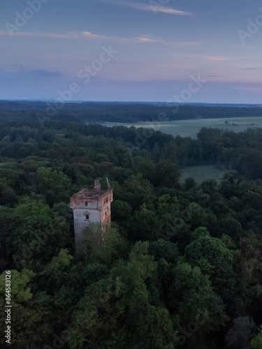 Obraz na płótnie ruins of a tower in the forest w salonie