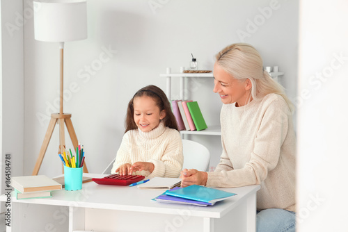 Little girl with her grandm...