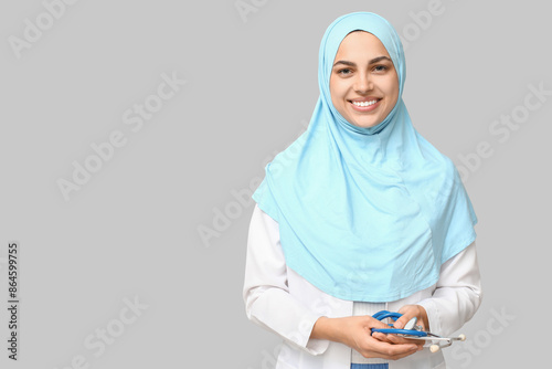 Portrait of female Muslim d...