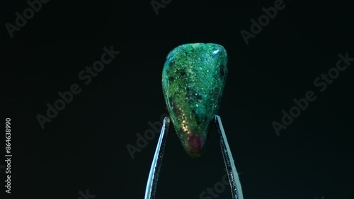 Close-up of Ruby in Zoisite, striking combination of ruby crystals in green zoisite. Contrast between the red rubies and green zoisite, showcasing its ornamental and jewelry use. Ideal for geological