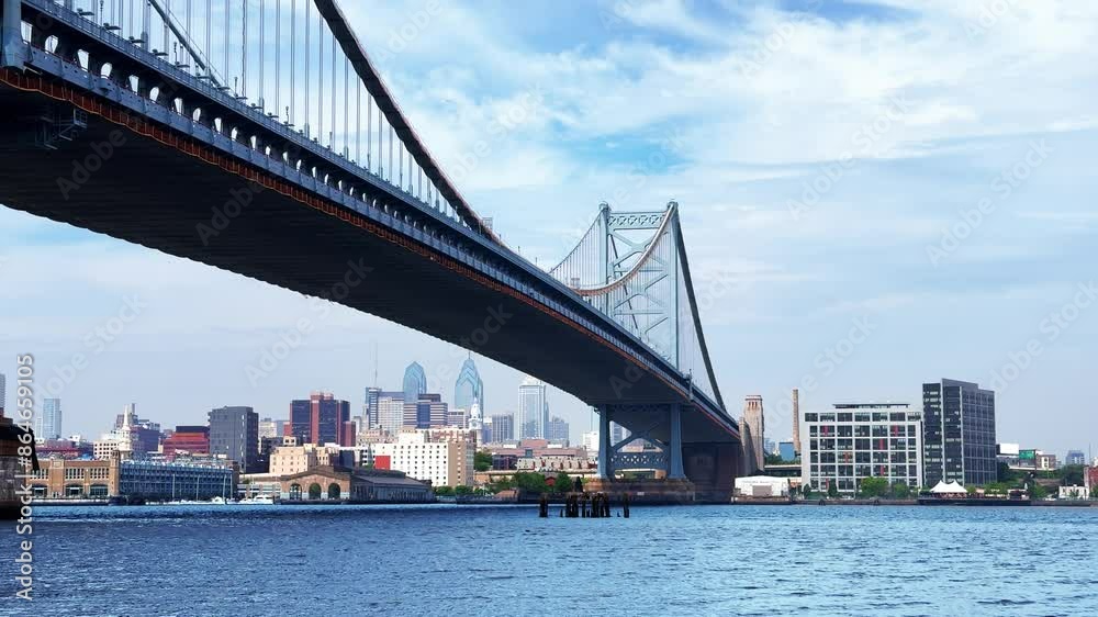 Under the Ben Franklin Bridge on a bright cloudy summer day, Philadelphia, Camden Under the Ben Franklin Bridge on a bright cloudy summer day, Philadelphia, Camden