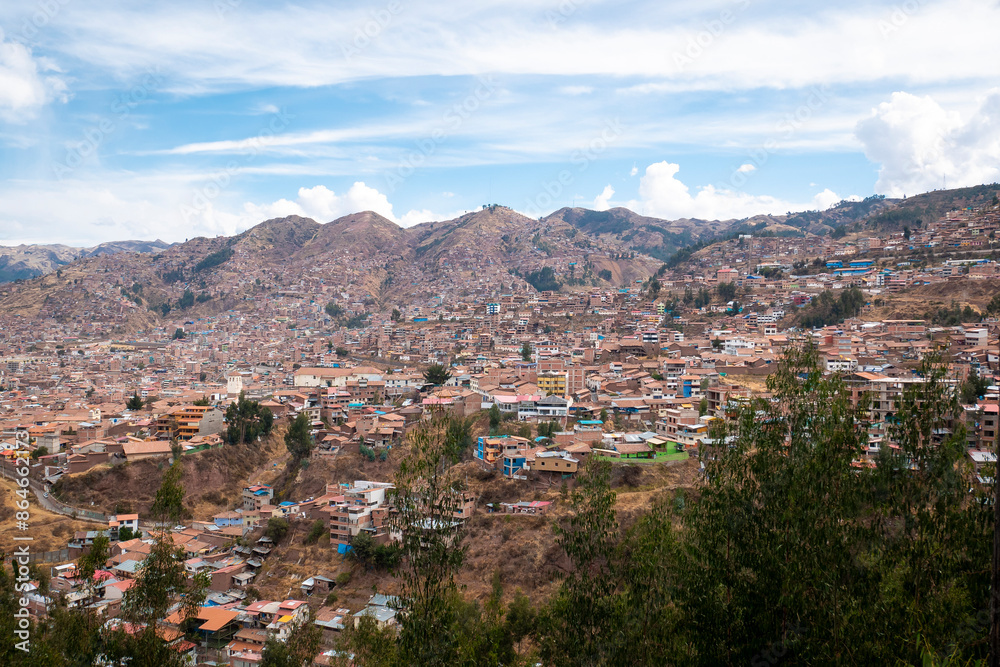 View of the City of Cusco with many Houses Around the Mountains