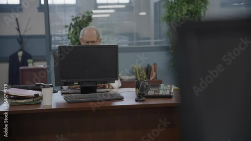 Wallpaper Mural Zoom out from police officer rolling away at desk Torontodigital.ca