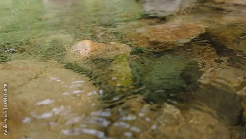 Video captured a large number of brown underwater rocks.
