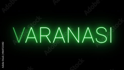 Flickering neon green glowing varanasi text animated on black background