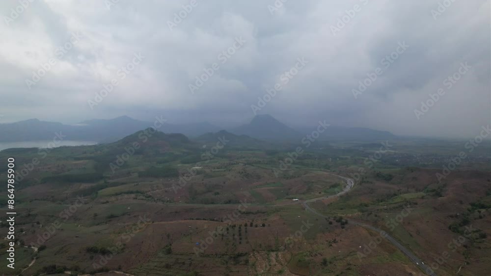 aerial view of cloudy sky over mountains and plateau aerial view of cloudy sky over mountains and plateau