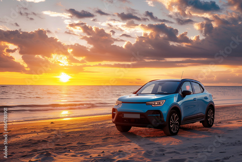 Blue compact SUV car with sport and modern design parked on concrete road by sea beach at sunset. New shiny SUV car drive for travel on summer vacations with road trip. Front view of electric car