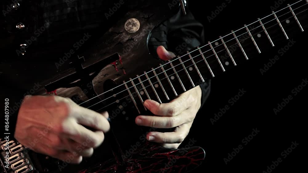 CLOSE UP VIDEO OF GUITARIST PLAYING A SOLO. DETAIL AT YOUR HANDS