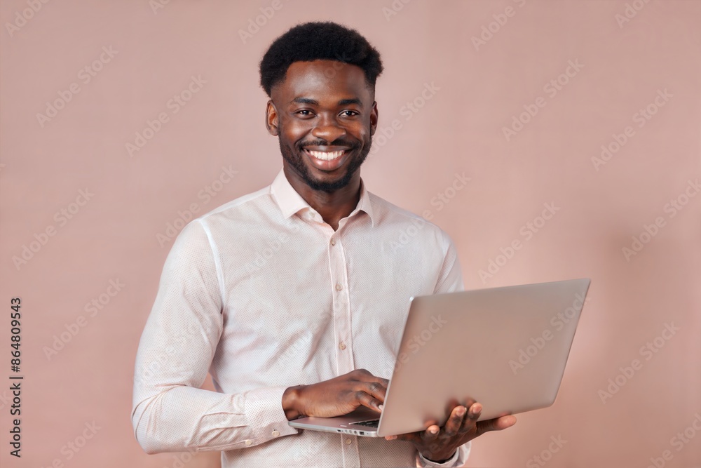 Smiling Black Male Manager with Laptop
Smiling Black Male Manager with Laptop