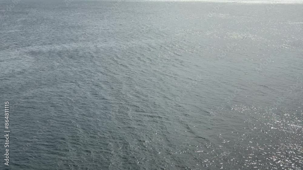 Ocean blue shiny water surface.