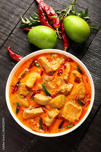 Hot and spicy mango fish curry  Kerala cuisine.