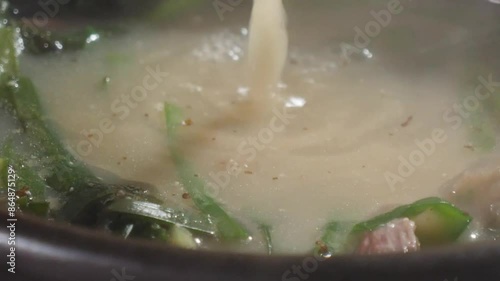 김이 모락모락 나는 소고기 국밥 한 국자 photo