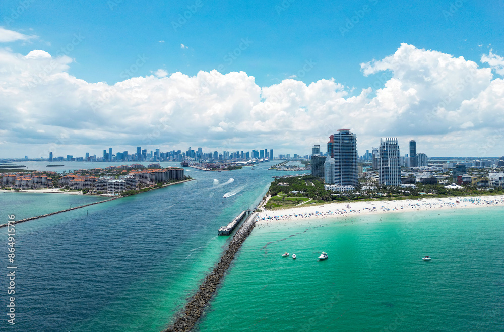 Obraz premium Summer in Miami . Miami beach coastline. Panoramic view of Luxury condos in Miami Beach Florida. Aerial View of Surfside Miami Beach.