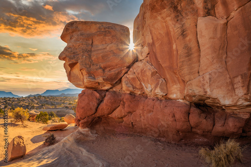 Φωτογραφία Sunset in the Formations at Devil's Garden, Hole in the Wall Road, Grand Stairca
