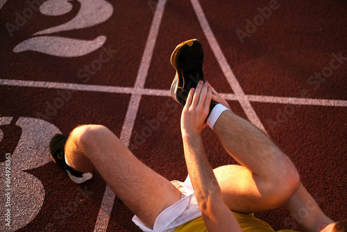 Portrait of a track and field athlete injured during a marathon