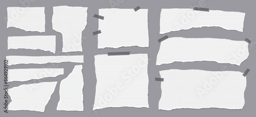 Set of torn white note paper pieces are on grey background for text, or ad.