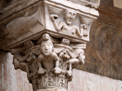 Verona dome cathedral church exterior sculptures detail. Romanesque sculpture attributed to the workshop of Veronese sculptor Brioloto photo