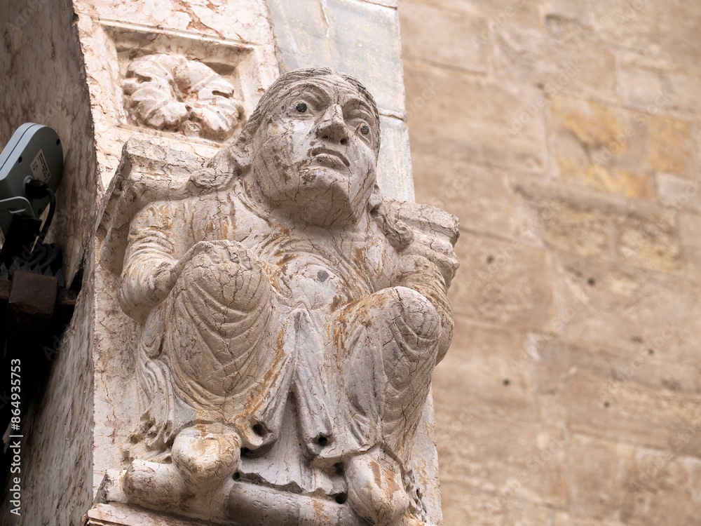 Obraz premium Verona dome cathedral church exterior sculptures detail. Romanesque sculpture attributed to the workshop of Veronese sculptor Brioloto