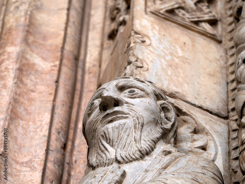 Verona dome cathedral church exterior sculptures detail. Romanesque sculpture attributed to the workshop of Veronese sculptor Brioloto photo