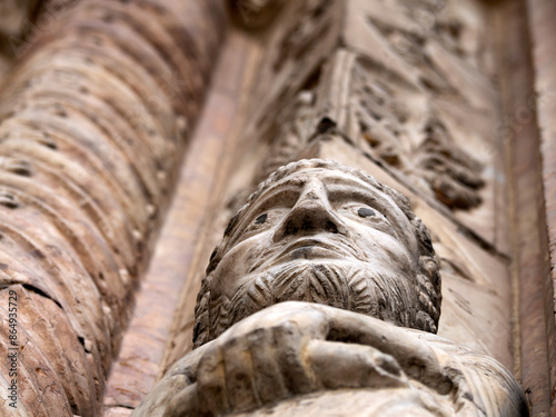 Verona dome cathedral church exterior sculptures detail. Romanesque sculpture attributed to the workshop of Veronese sculptor Brioloto photo