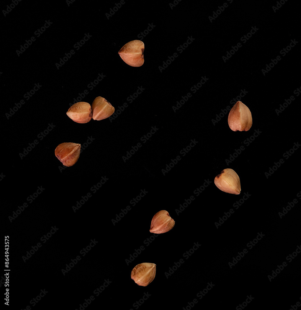 Buckwheat isolated on a black background. Close-up Buckwheat isolated on a black background. Close-up