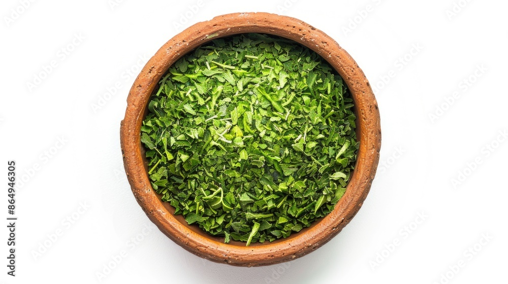 Fresh cut grass in a natural wood bowl, perfect for decorating or styling Fresh cut grass in a natural wood bowl, perfect for decorating or styling