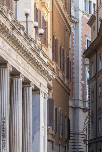 Rome classic style historical architecture. Piazza Colonna alley. Italy