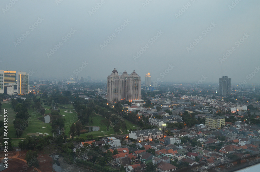 Obraz premium The skyline of Jakarta, Indonesia showing the air pollution endemic in the city
