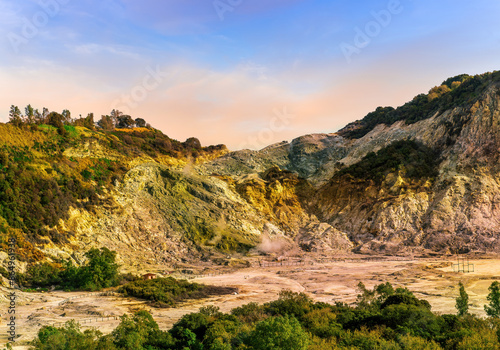 landscape of Plegrean volcano fields in Naples Italy near Pompeii with sulfur yellow caldera duribg eruption of smoke. campi Flegrei and cataclysm of Earthquake photo