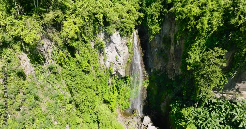 Top view of Waterfall in the tropical mountain jungle. Negros, Philippines. Top view of Waterfall in the tropical mountain jungle. Negros, Philippines.