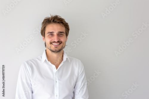 Professional Man in White Shirt Smiling at the Camera. Generative AI.