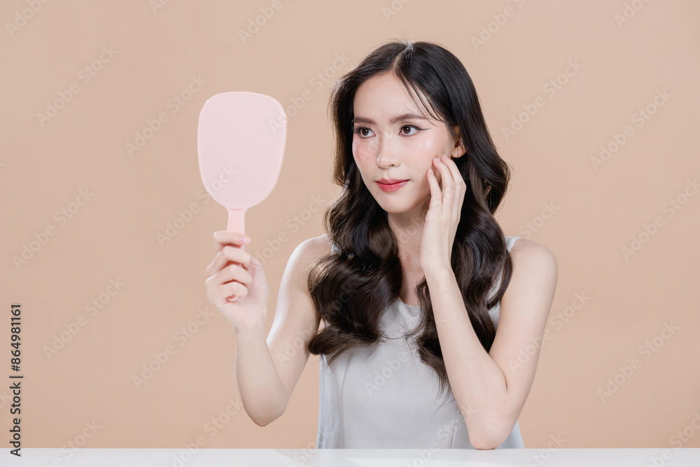 young asian woman with clean fresh skin on beige background, Cosmetics, Face care, Facial treatment, Cosmetology, beauty and spa, Asian women portrait. woman with make up brush cosmetic Beautiful young asian woman with clean fresh skin on beige background, Cosmetics, Face care, Facial treatment, Cosmetology, beauty and spa, Asian women portrait. woman with make up brush cosmetic Beautiful