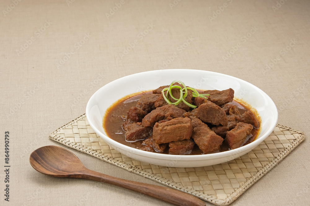 Daging Kelem, made from beef, coconut milk and spices. Indonesian food
Daging Kelem, made from beef, coconut milk and spices. Indonesian food