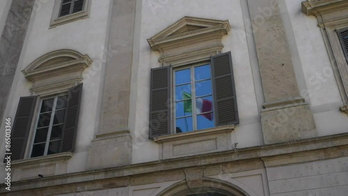 Italian flag on Royal Palace of Milan, Italy photo