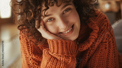 A woman in orange sweater