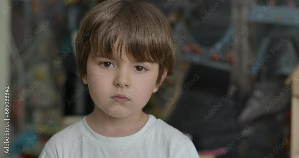 Portrait Little Child Boy Looking at Camera. Young Serious Thinking Curiosity Child Looking at Camera. Closeup. Indoors. Sad Kid Boy Portrait. Face Serious Contemplative Child. Portrait Little Child Boy Looking at Camera. Young Serious Thinking Curiosity Child Looking at Camera. Closeup. Indoors. Sad Kid Boy Portrait. Face Serious Contemplative Child.