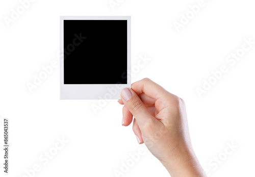 Hand holding blank photo frame on isolated white background
