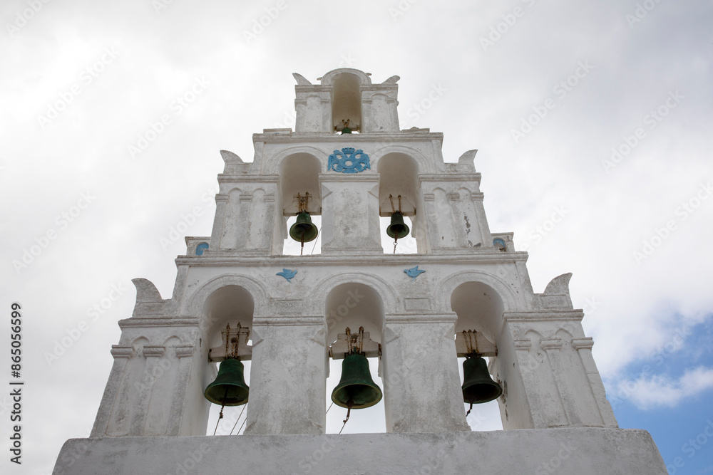 Santorini - Greece - May 17, 2024: Megalochori bell tower, Santorini, Cycladic Islands, Greece. Santorini - Greece - May 17, 2024: Megalochori bell tower, Santorini, Cycladic Islands, Greece.