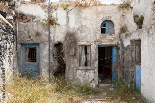 Santorini - Greece - May 17, 2024: An old and abandoned house in Megalochori, Santorini, Cycladic Islands, Greece.