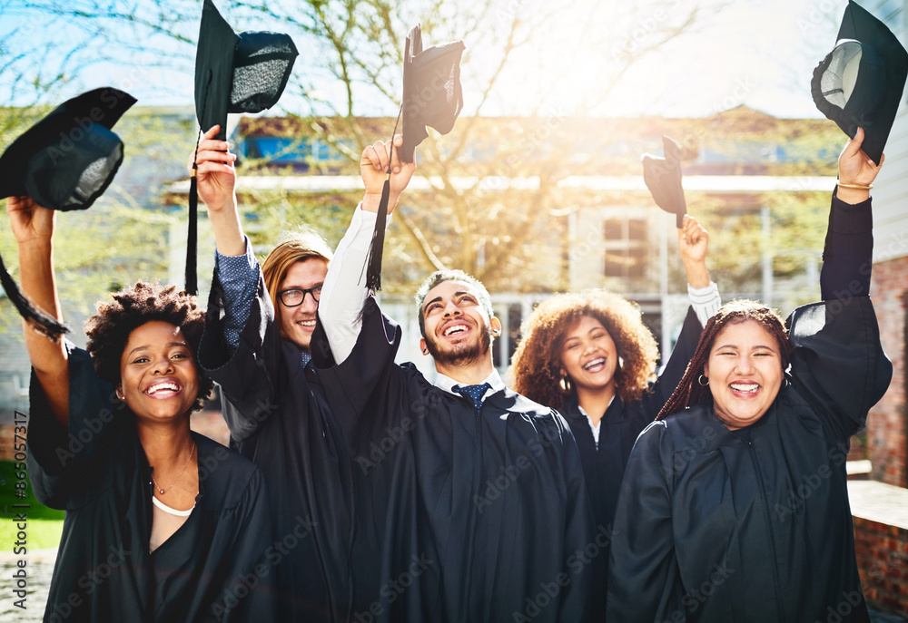 Obraz premium Graduation, portrait and students at university celebration with education, diversity or happy achievement. College, arms raised and excited people at campus event with knowledge, smile and success