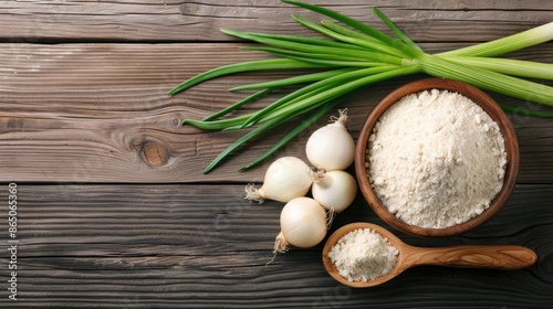 A rustic arrangement of culinary ingredients on a wooden surface. A wooden bowl filled with onion powder and a wooden spoon holding a scoop of the powder - AI Generated Digital Art