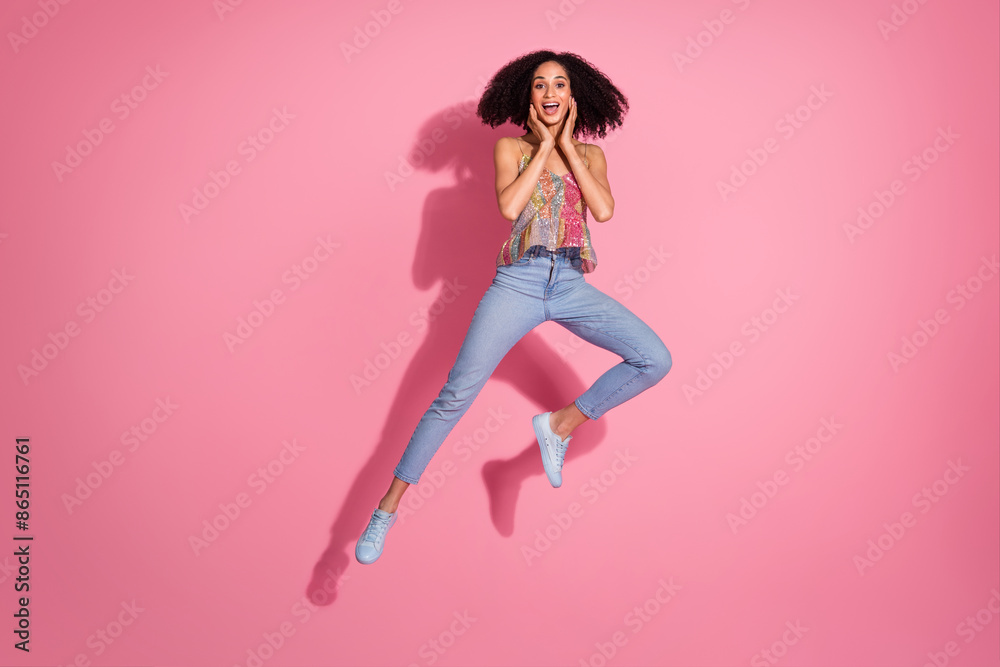 Full body photo of attractive young woman jump amazed touch cheeks dressed stylish sequins clothes isolated on pink color background Full body photo of attractive young woman jump amazed touch cheeks dressed stylish sequins clothes isolated on pink color background
