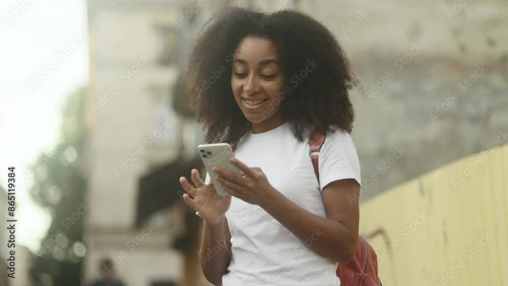 Portrait of young woman hold smartphone scrolling social media texting browsing online at urban city Pretty female relax enjoying great day at street outdoors Portrait of young woman hold smartphone scrolling social media texting browsing online at urban city Pretty female relax enjoying great day at street outdoors