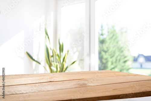 blurred background of window in kitchen with table