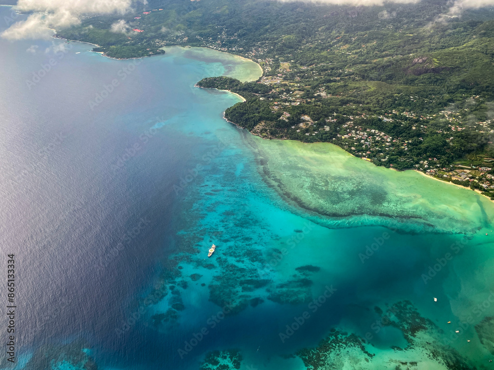 Beautiful seascapes of Seychelles islands with sun and turquoise waters Beautiful seascapes of Seychelles islands with sun and turquoise waters