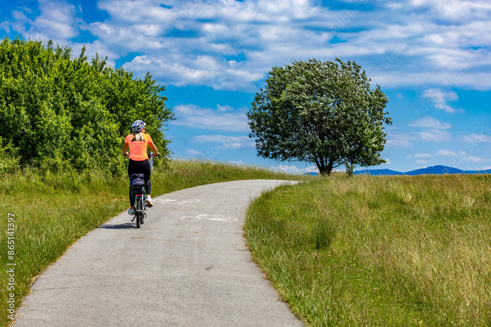 Bicycle route for a trip around Lake Czorsztyn, panorama of the Tatra Mountains