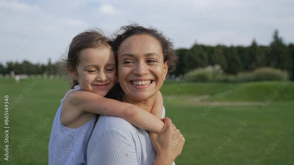 Joyful moment of a mother and daughter bonding and enjoying a fun summer day in the park. Capturing happiness and family love. 4k high res Joyful moment of a mother and daughter bonding and enjoying a fun summer day in the park. Capturing happiness and family love. 4k high res