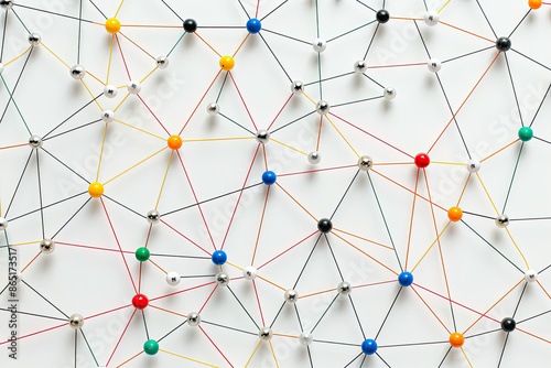Colorful Network with Metallic Balls and Nodes on White Background