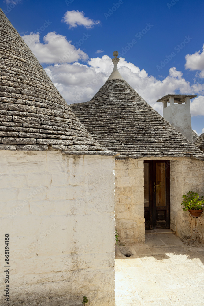 Trulli houses, traditional, unique Apulian dry stone hut with a conical roof, Alberobello, Italy